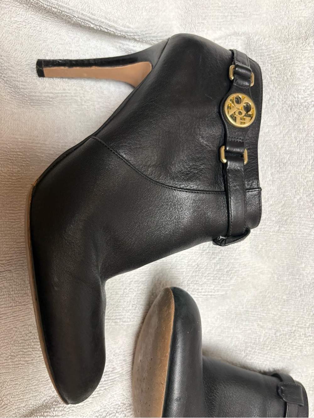 Coach Black Leather Ankle Boot with Gold Accent